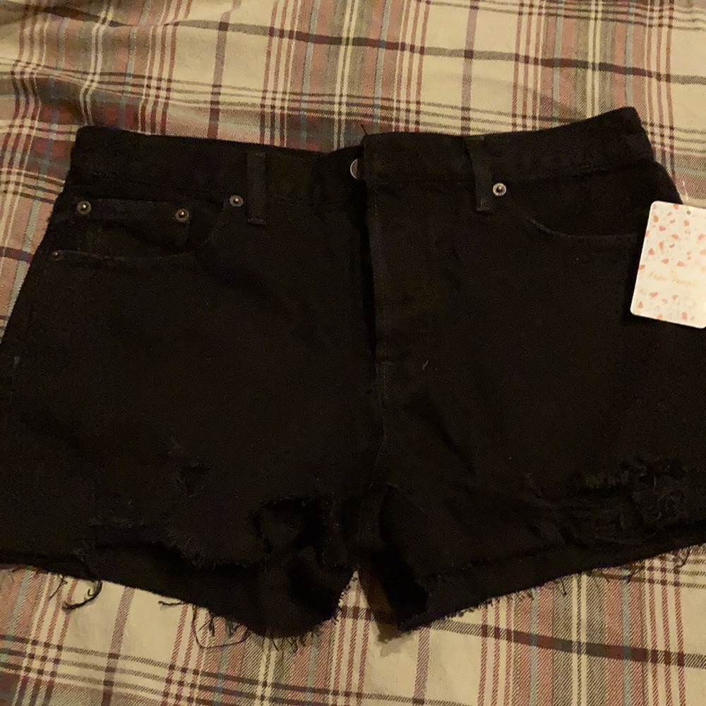 Black cutoff distressed jean shorts